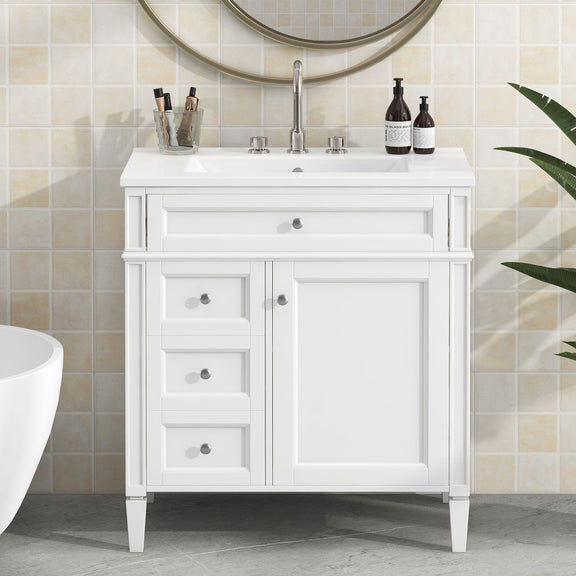 White bathroom vanity with top sink and cabinet doors, two drawer stacks on left