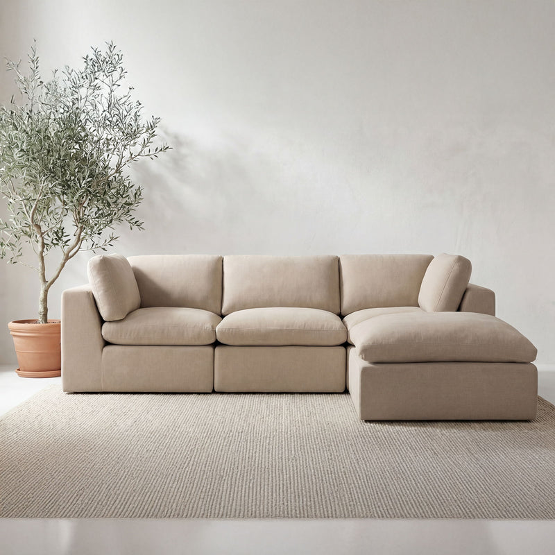 Pebble beige modular sectional sofa with chaise-style right arm and plush cushions