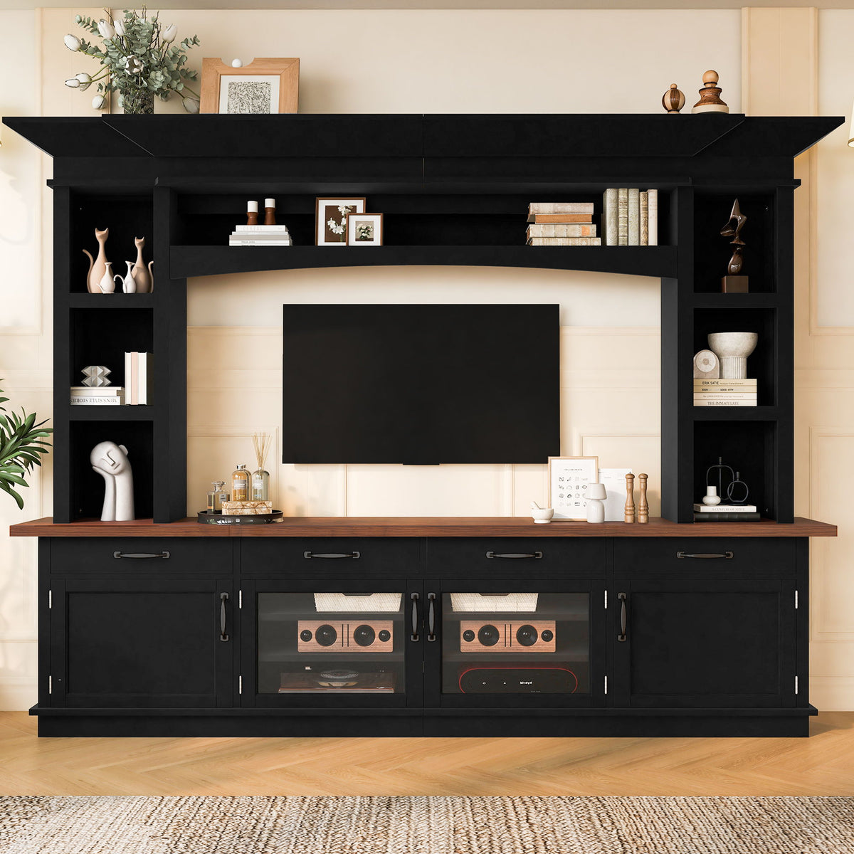 Black extra-long TV stand with open shelves, cabinet doors, and drawers along the front