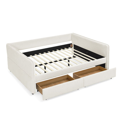 White upholstered daybed with open storage drawers and slatted base