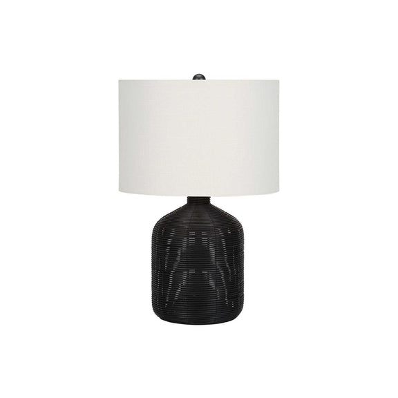 Modern table lamp with black rattan base and white fabric drum shade