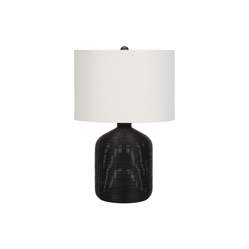Modern table lamp with black rattan base and white fabric drum shade