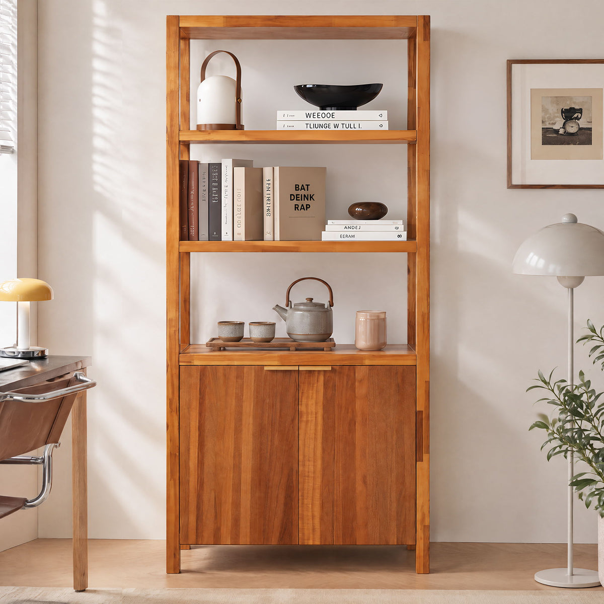Light brown wooden bookcase cabinet with open shelves and double doors, styled with decor