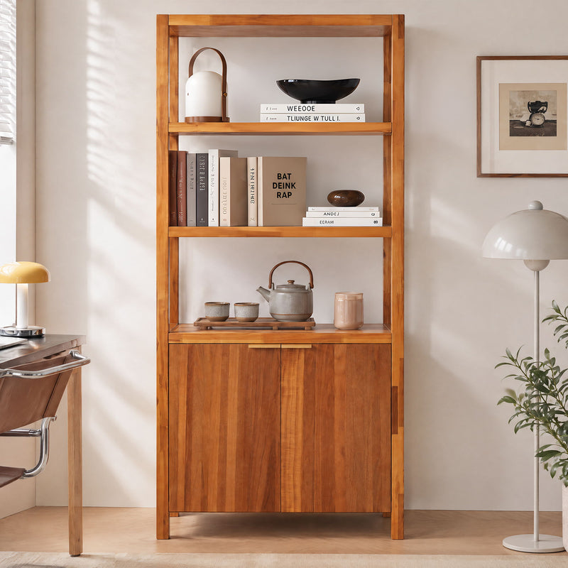 Light brown wooden bookcase cabinet with open shelves and double doors, styled with decor