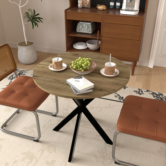 Compact round table with rustic wood surface and black X base in a dining setup