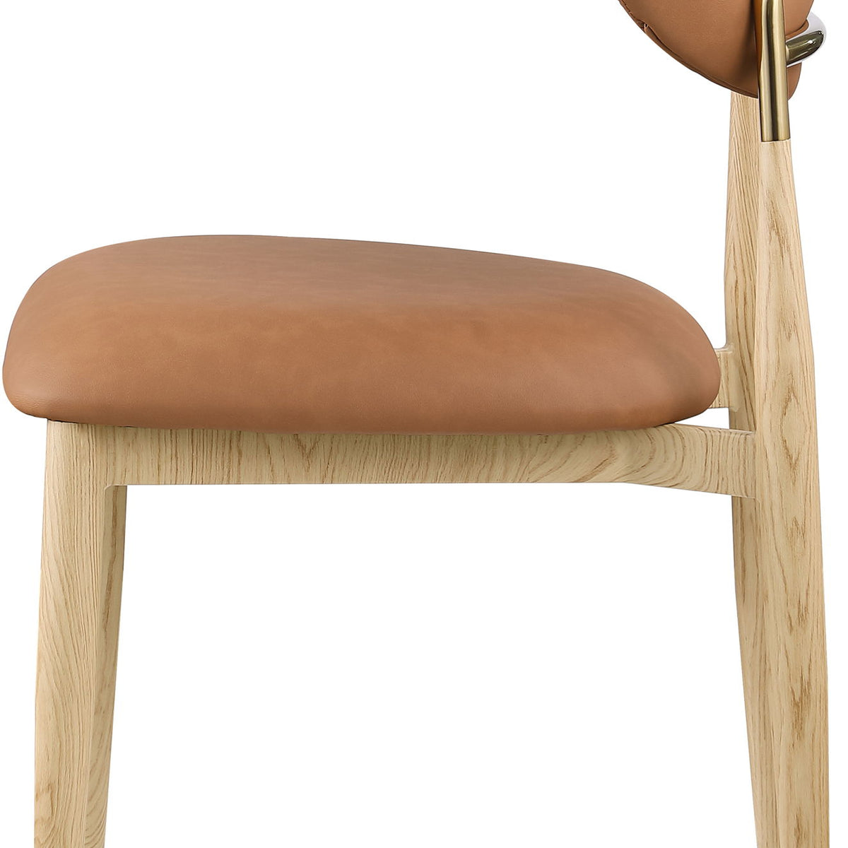 Warm brown upholstered dining side chair close-up with light wood legs