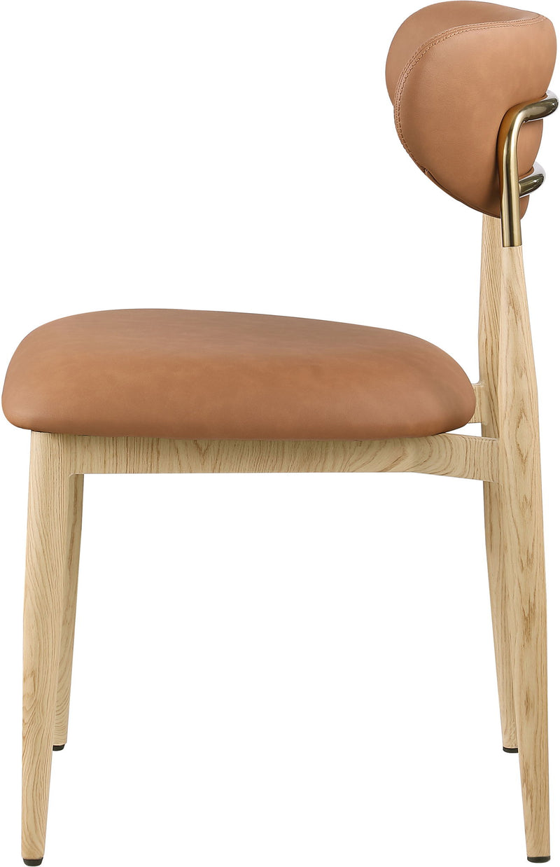 Warm brown upholstered dining side chair close-up with light wood legs