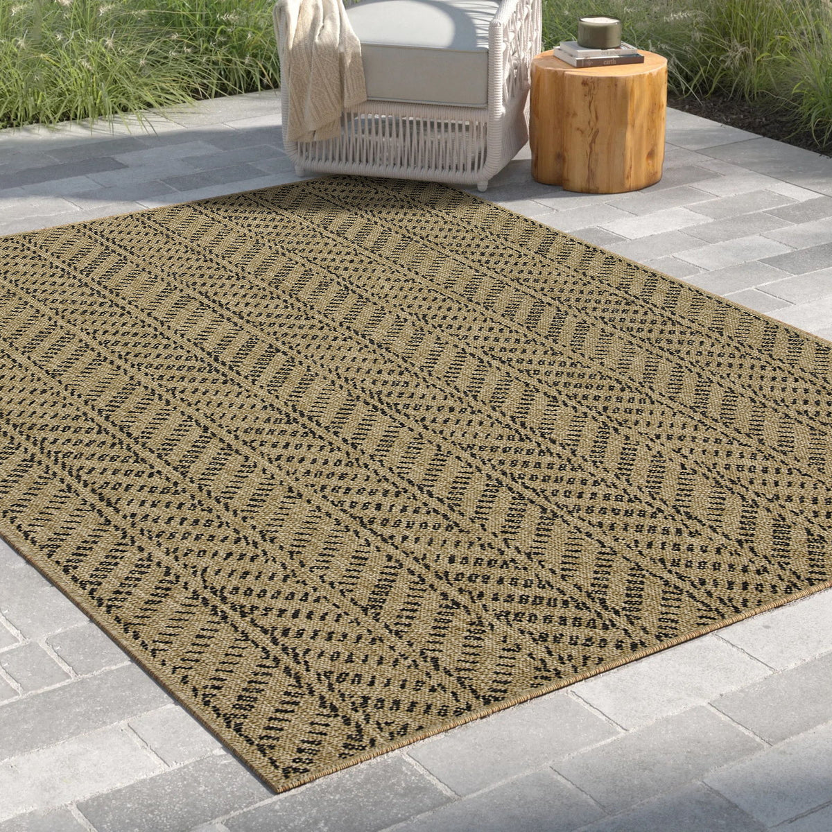 Light brown indoor/outdoor area rug with dark dotted diamond pattern