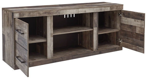 Gray TV stand with open shelves and side drawers, angled view of cabinet