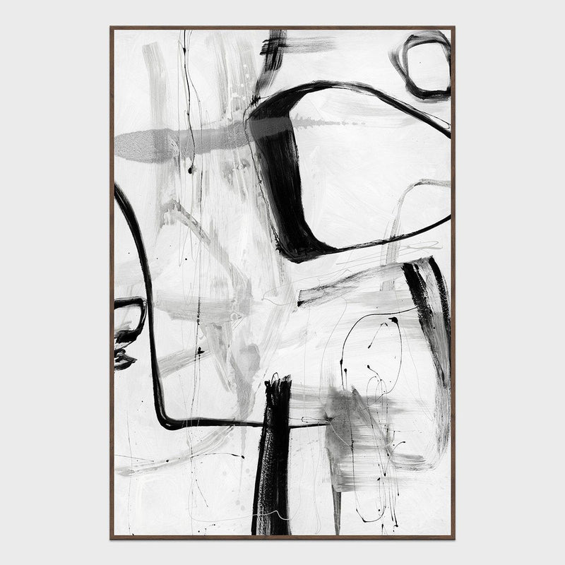 Framed abstract painting with black and gray strokes on a light background