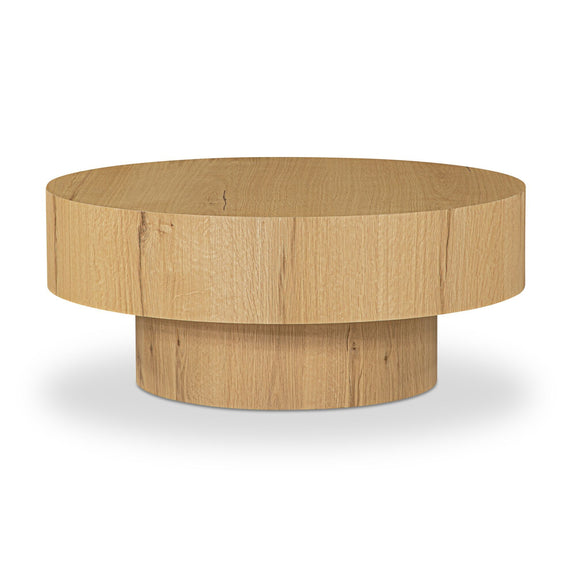 Round rustic oak coffee table with visible wood grain and central pedestal base