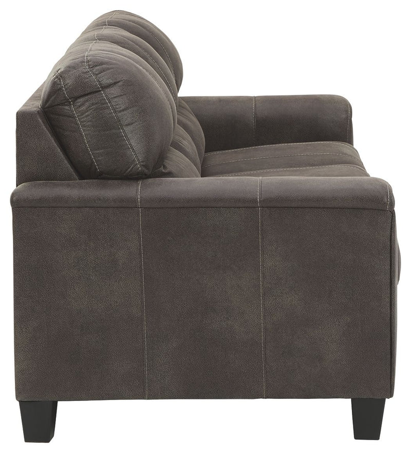 Dark gray upholstered sofa with deep cushioned back and track arms