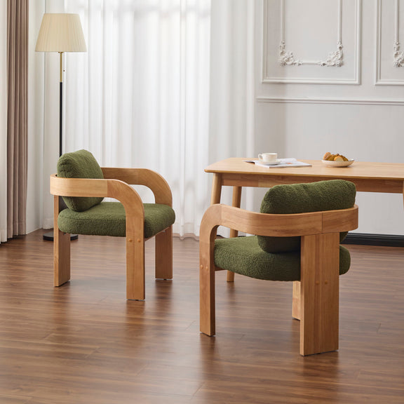 Pair of dark green dining chairs shown from the side and back, with curved wooden arms