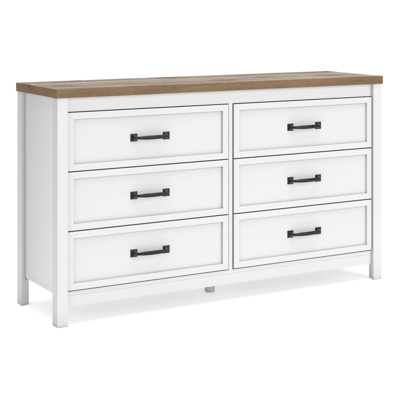 White six-drawer dresser with brown top and black bar handles