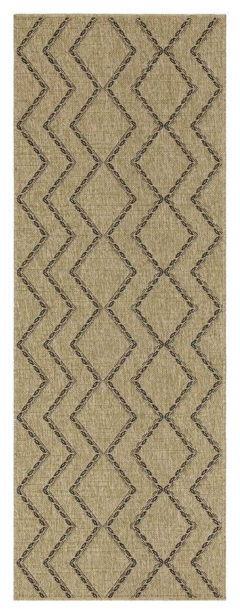 Light brown area rug with repeating chevron and diamond stitched geometric pattern