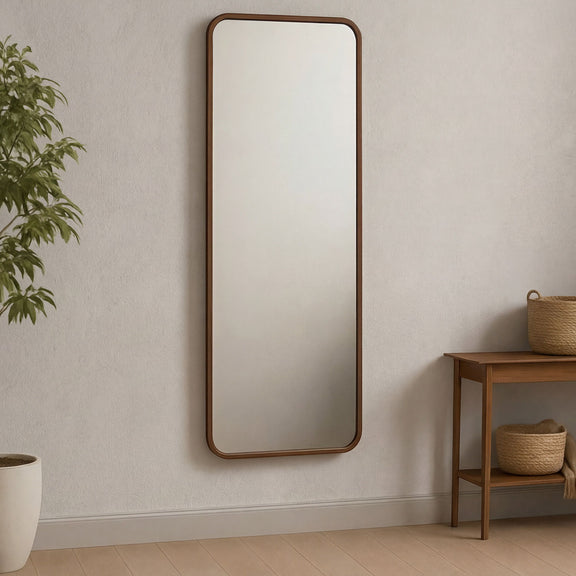 Vertical floor mirror with slim dark wood frame and rounded corners, full-length glass
