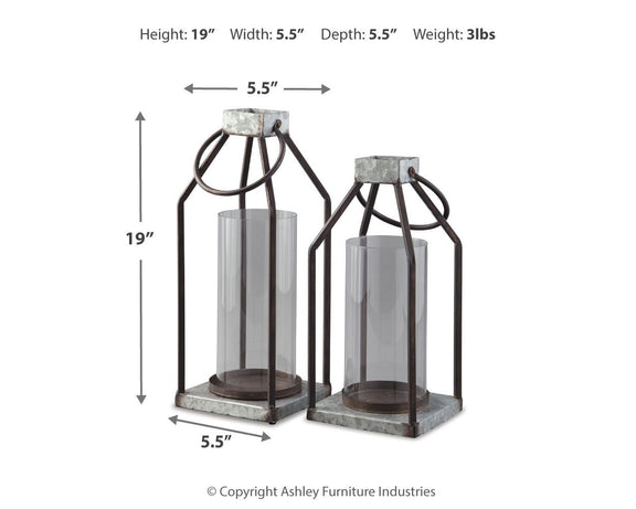 Two lanterns with dark metal arches, gray stone tops, and frosted glass cylinders