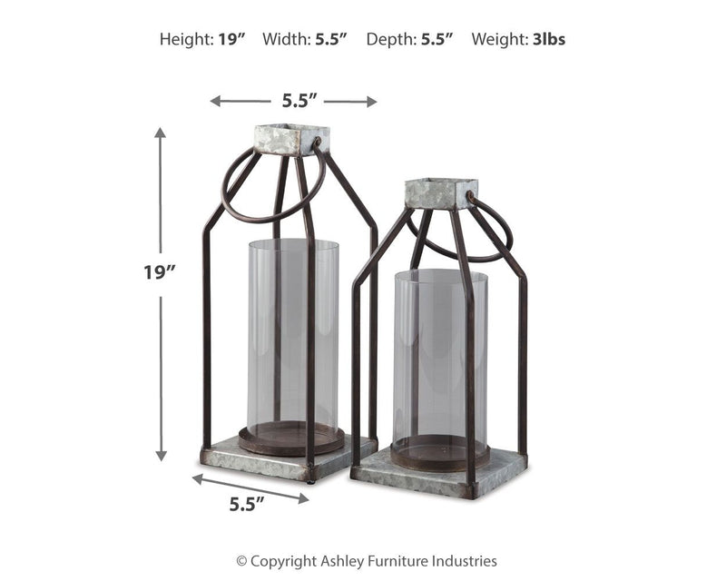 Two lanterns with dark metal arches, gray stone tops, and frosted glass cylinders