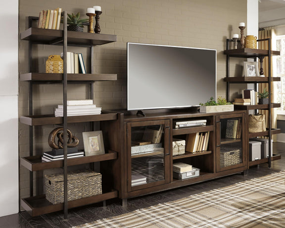 Dark brown TV stand with faux fireplace insert and side open shelving units
