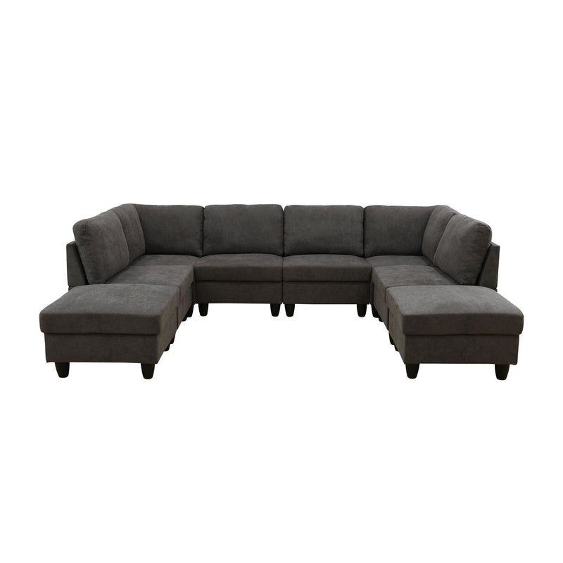 Dark gray U-shape modular sectional sofa with padded back, wide arms, and chaise seats
