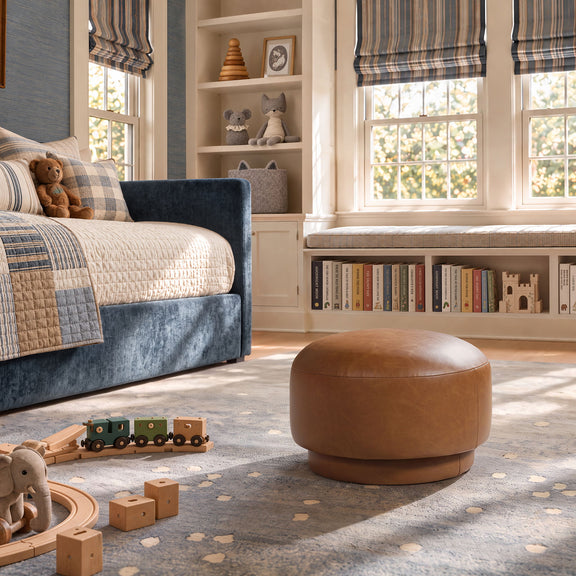 Light brown rounded mushroom ottoman footstool with low, wide profile