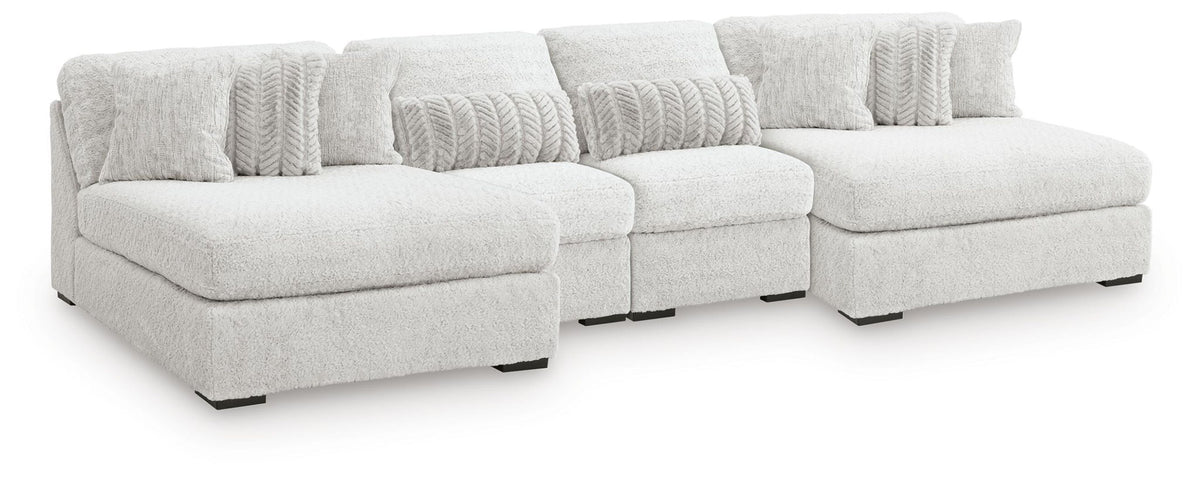 Light gray cuddle plush sectional with left and right seats, corner, and textured back cushions