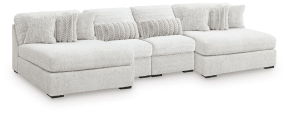 Light gray cuddle plush sectional with left and right seats, corner, and textured back cushions