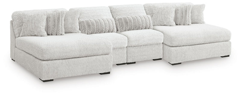 Light gray cuddle plush sectional with left and right seats, corner, and textured back cushions