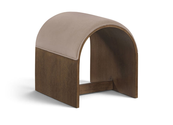 Light beige velvet upholstered bench with arched back and dark wood base