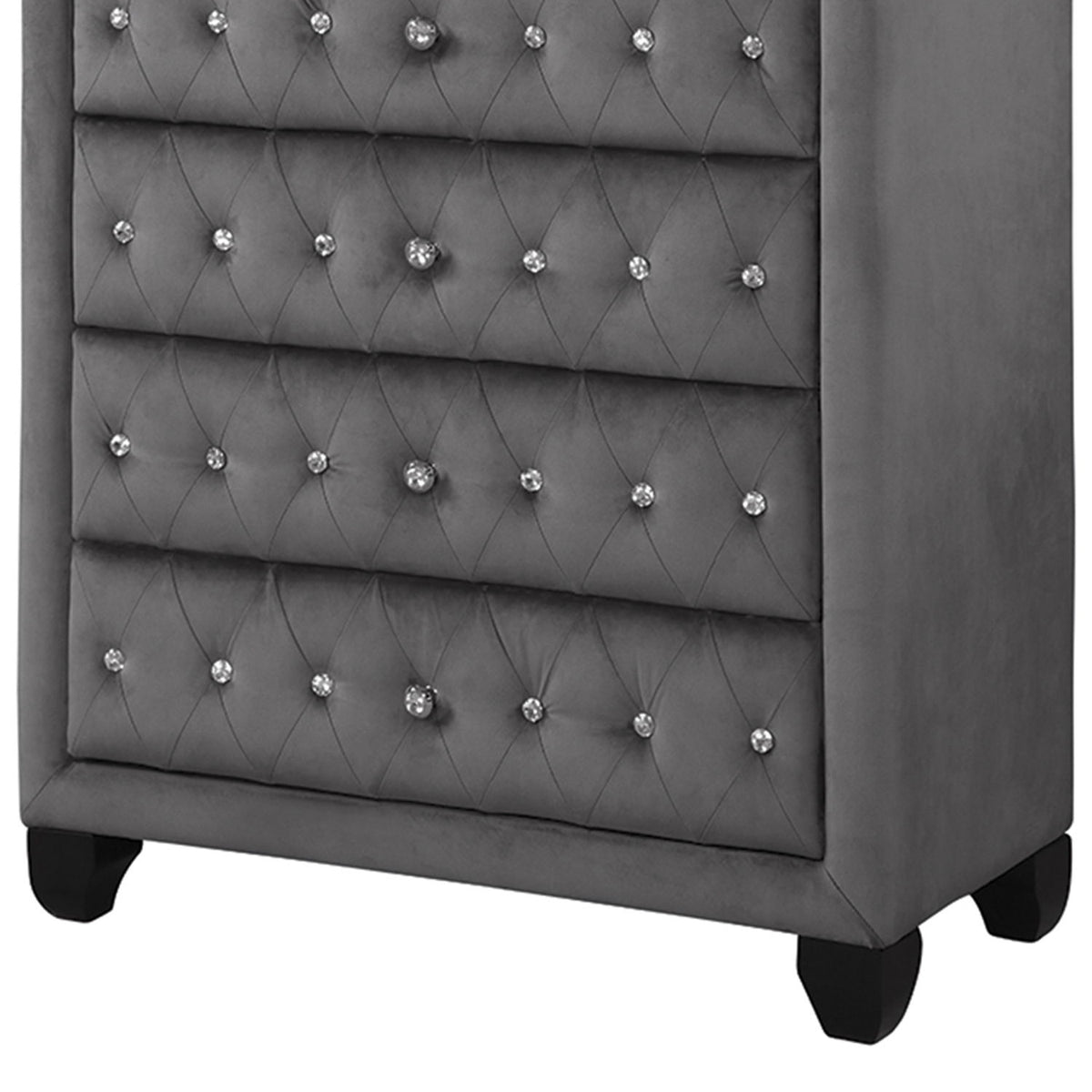 Gray tufted drawer fronts with sparkling silver stud buttons