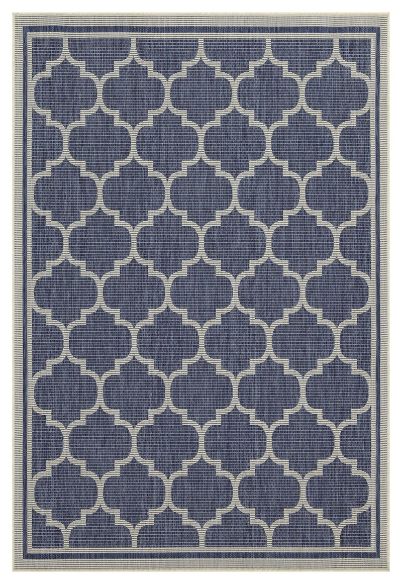 Medium blue polypropylene area rug with repeating quatrefoil pattern and thin border