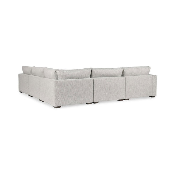 Ivory upholstered modular sectional sofa with L-shaped chaise and square seat cushions
