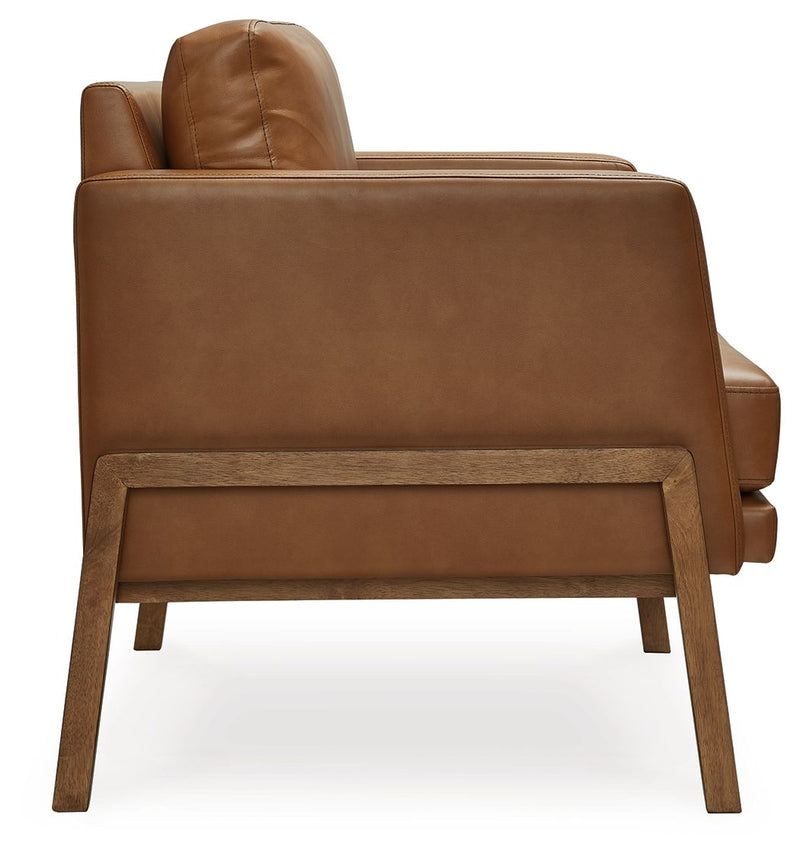 Caramel accent chair rear view with tufted back and sturdy wooden frame