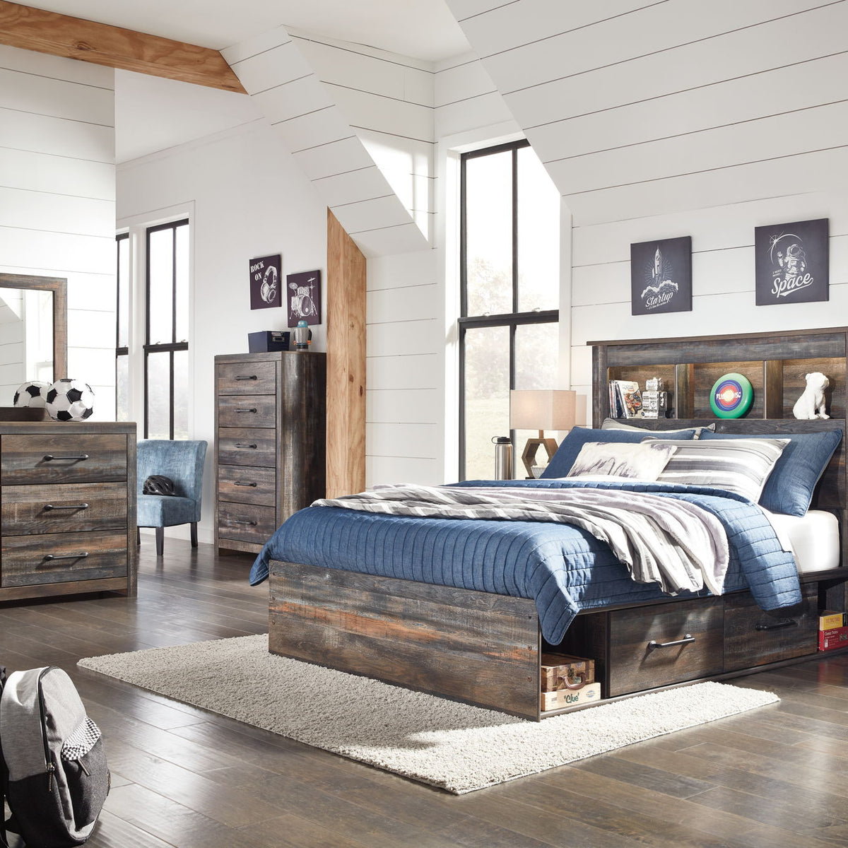 Panel bookcase bed with open shelves, upholstered pillows, and side drawer storage, dark wood.