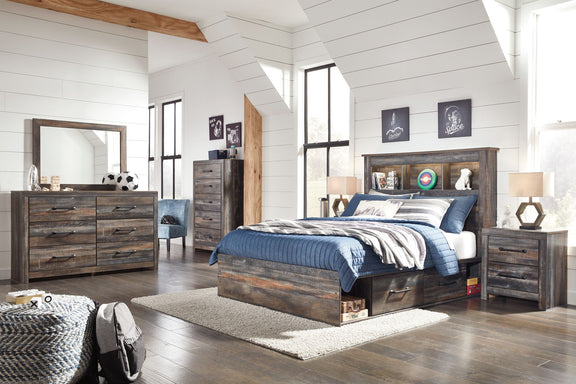 Panel bookcase bed with open shelves, upholstered pillows, and side drawer storage, dark wood.
