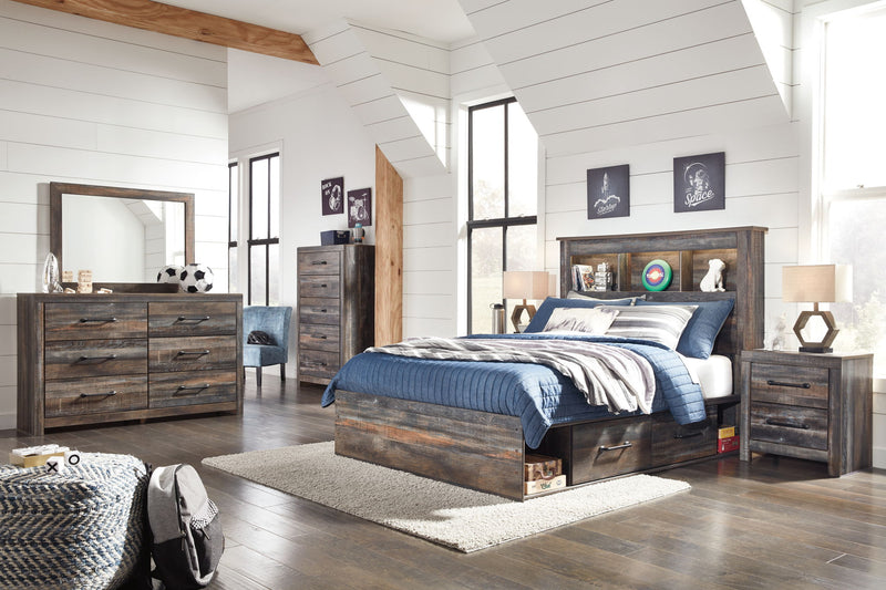 Panel bookcase bed with open shelves, upholstered pillows, and side drawer storage, dark wood.
