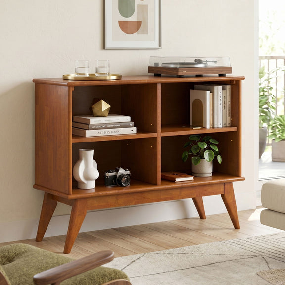 Low bookcase in warm brown wood with open middle shelves and side storage cubbies