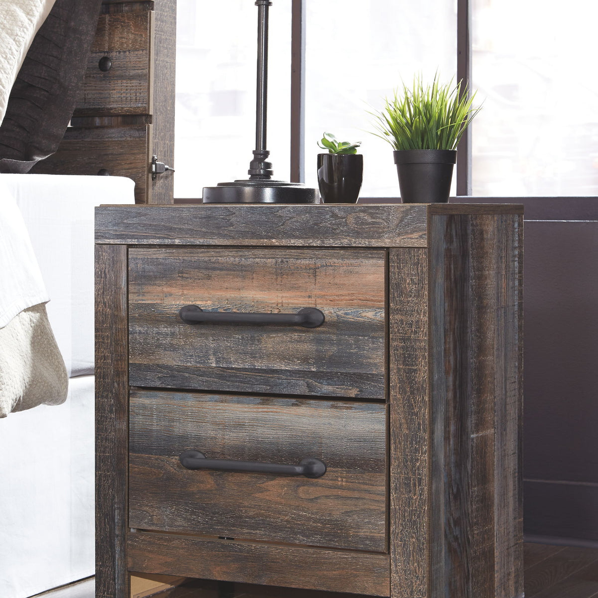 Two-drawer night stand with dark bronze drawer pulls, brown wood finish