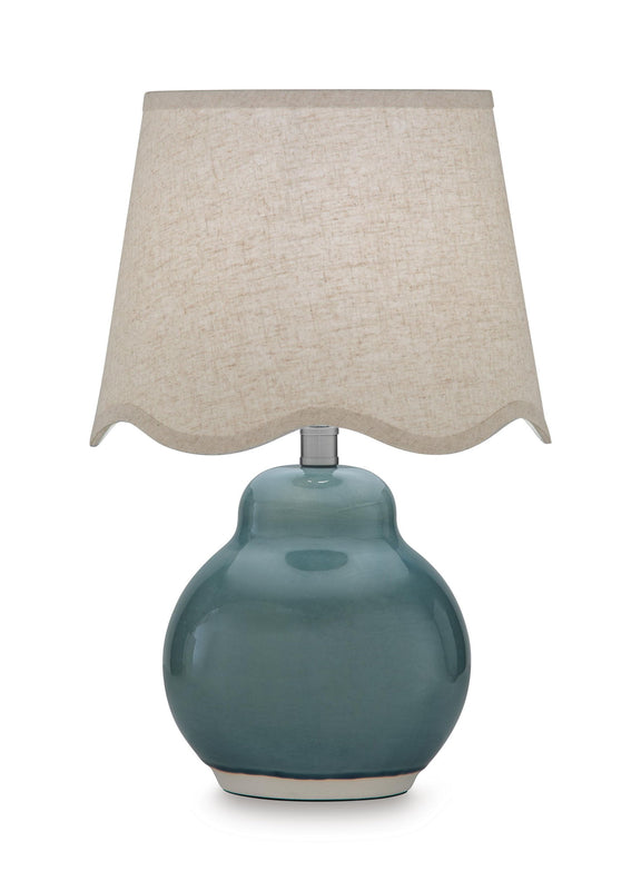 Blue ceramic table lamp with textured beige fabric shade
