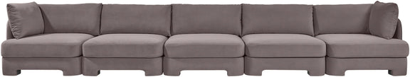 Gray velvet upholstered sectional sofa with five-seat modular layout