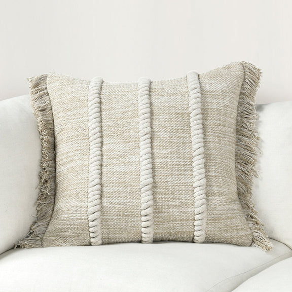 Natural fabric lumbar pillow with vertical stripe texture and fringe trim