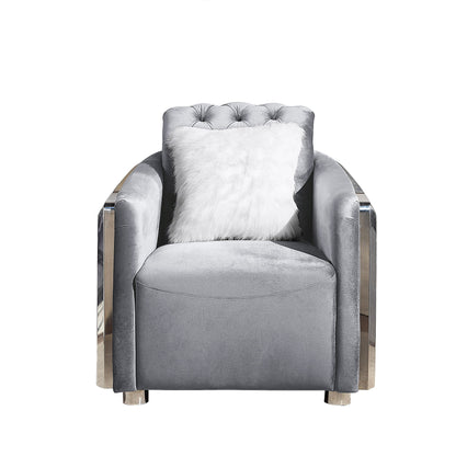 Gray accent chair with button-tufted back, faux fur square pillow, gold trimmed arms