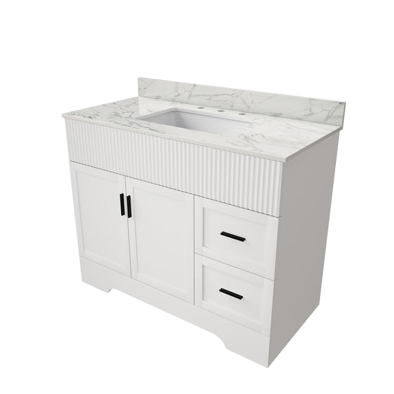 White bathroom vanity cabinet with fluted doors, undermount sink, and three faucet holes
