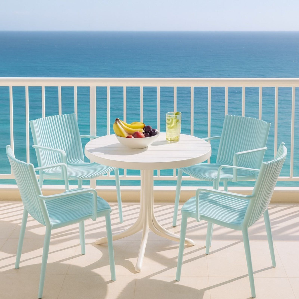 4 Modern Stackable Plastic Armchair Matched With Round Table