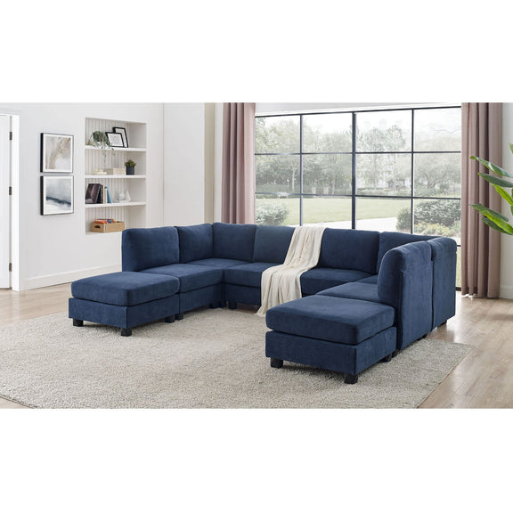 Blue sectional sofa with chaise ottoman seats and removable cushions, deep upholstered back