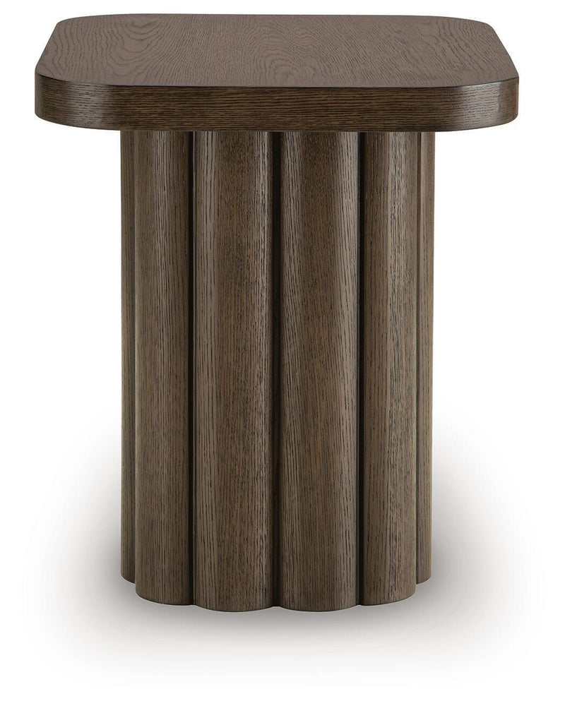 Dark brown rectangular table with smooth top and vertical fluted wood base