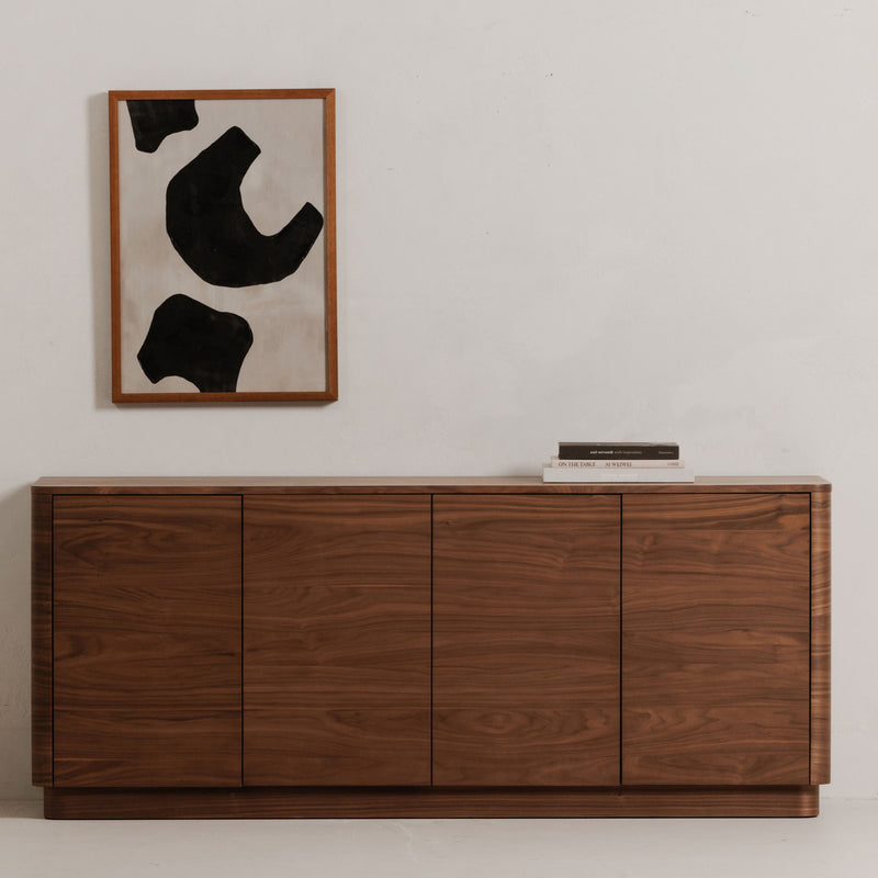 Walnut sideboard with four doors, low profile, and flat top surface