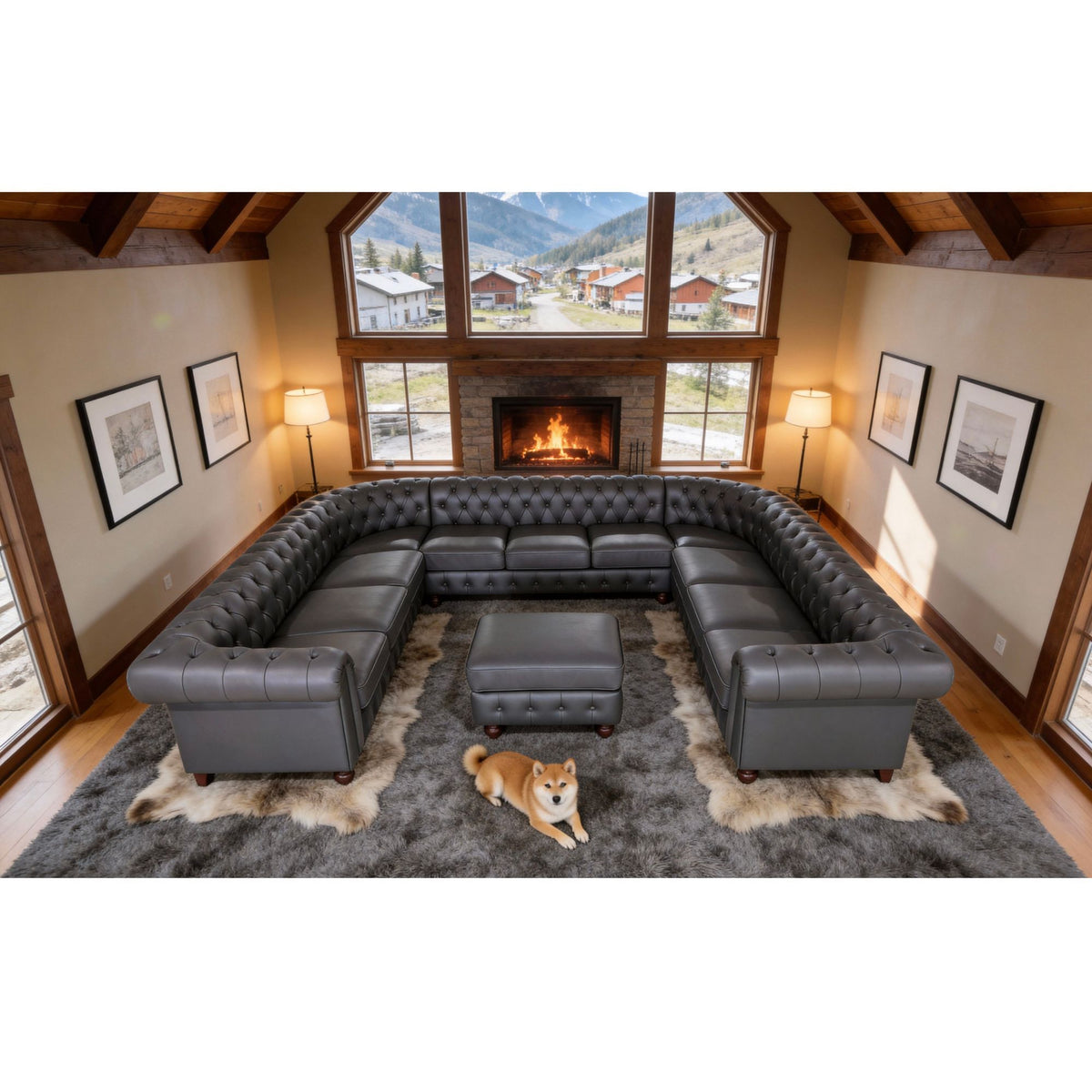 Dark gray tufted U-shape sectional sofa with central ottoman and rolled arm sections