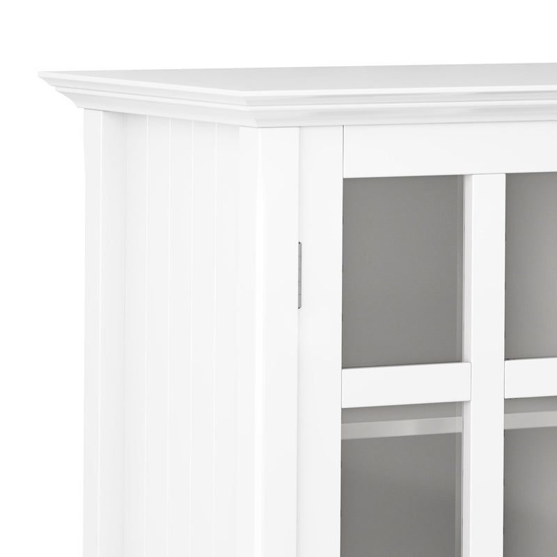 White medium storage cabinet with glass-pane door and interior shelves