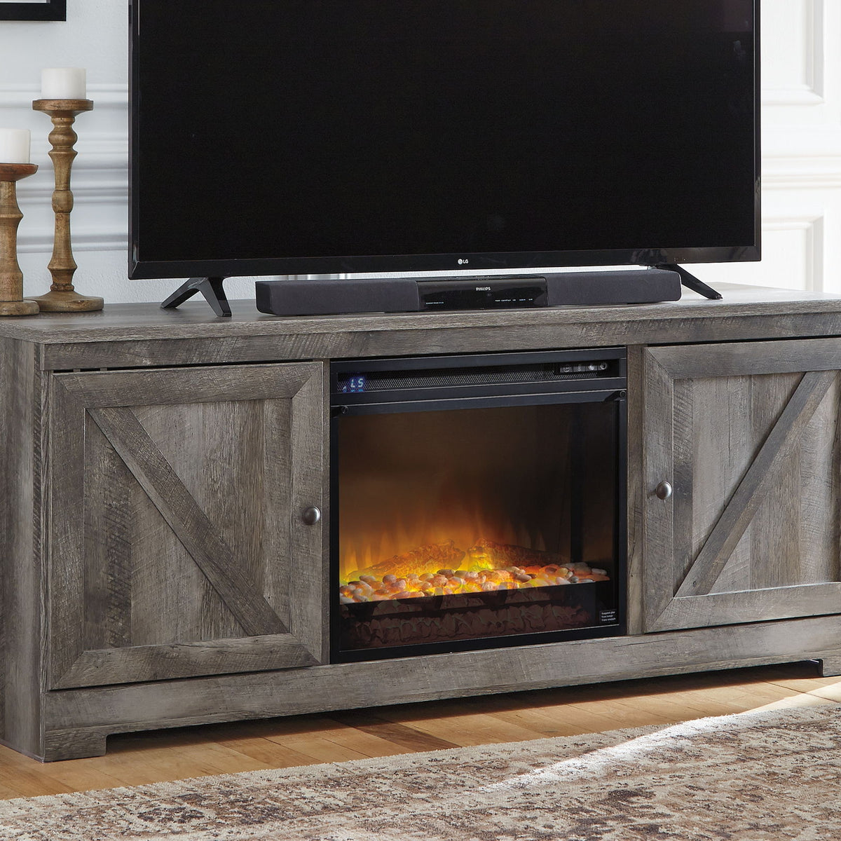 Wynnlow - 63" TV Stand With Glass/Stone Fireplace Insert - Gray